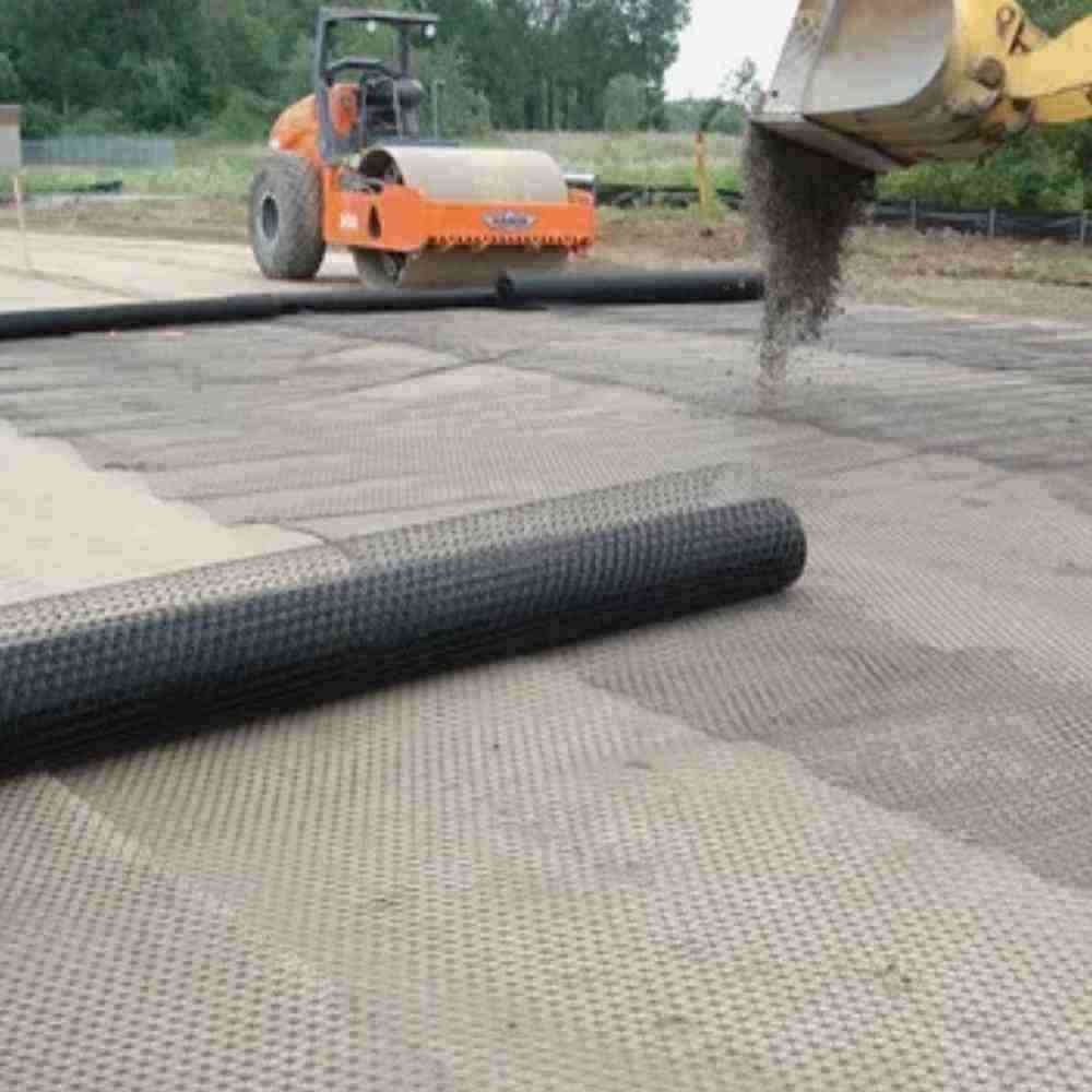 Precio de fábrica de 150 kn 100 kn de geomalla de poliéster de pavimento resistente a la grieta