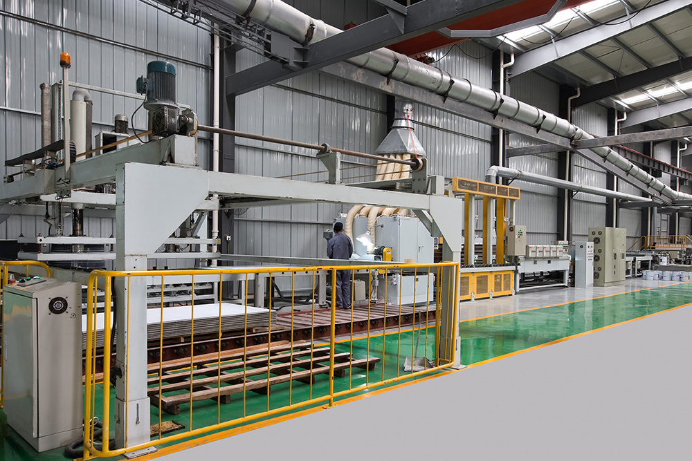 Inorganic pre-coated decorative board production line