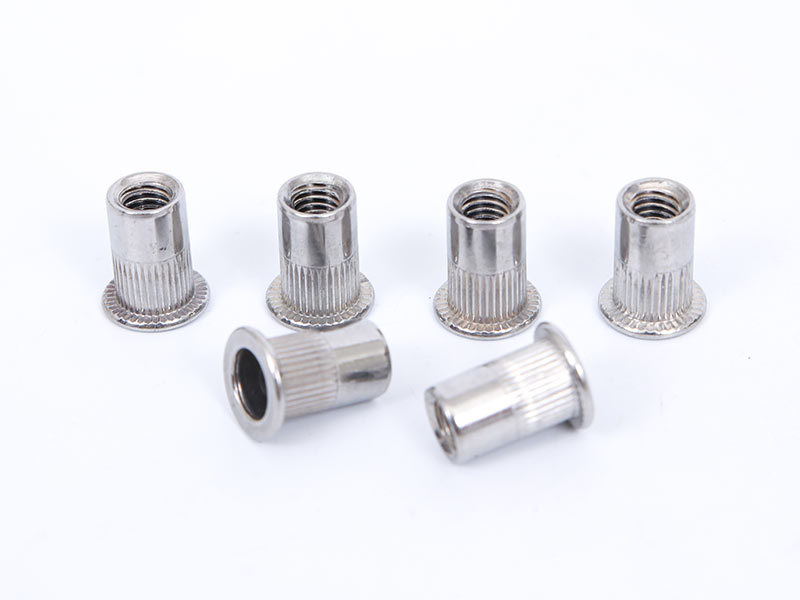 Stainless steel flat head vertical grain rivet nut