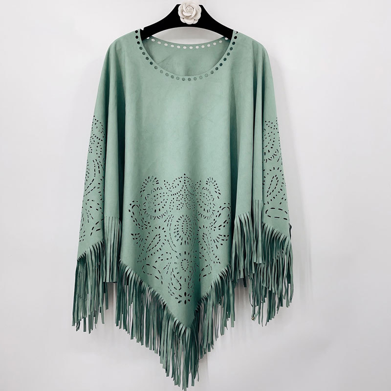 A niche suede warm shawl cape for women with a high-end and fashionable autumn and winter style tassels, paired with a hollowed out scarf