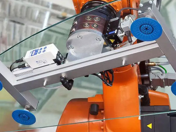 Automobile front glass processing unit