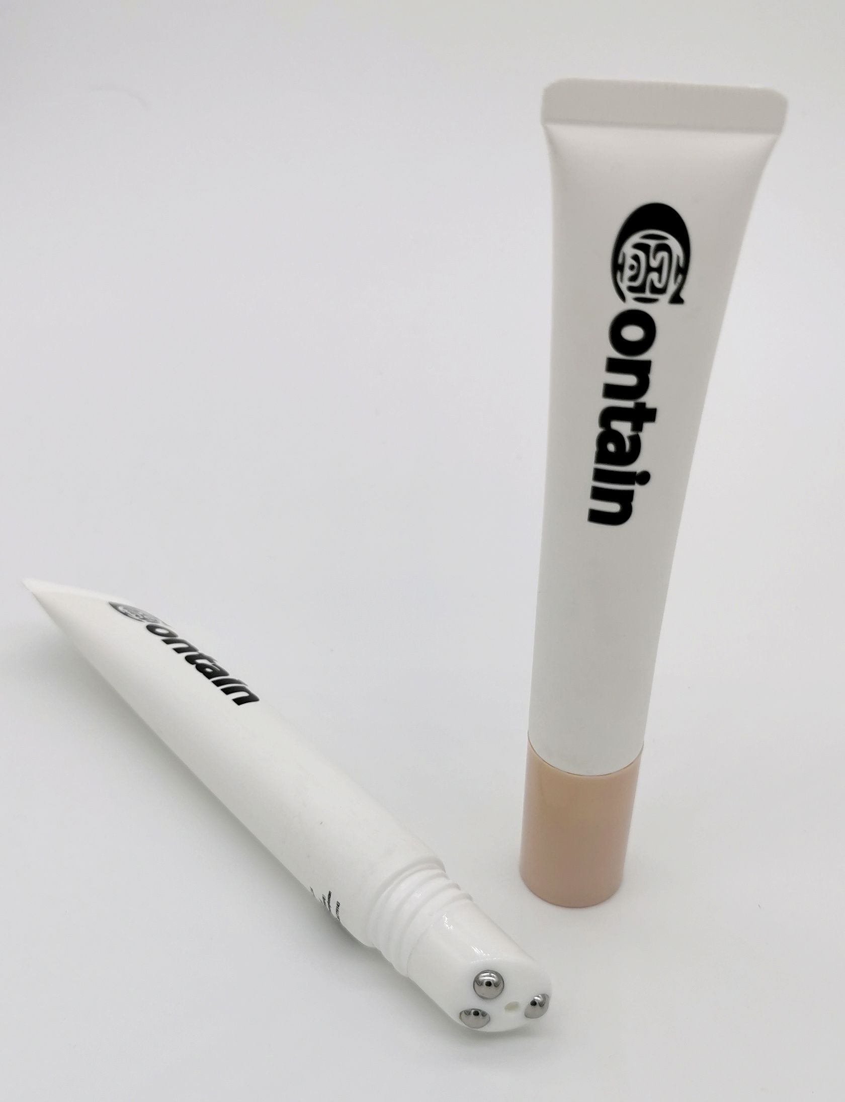Best selling Empty plastic packaging cosmetic squeeze eye cream tube with three roller balls massage cap