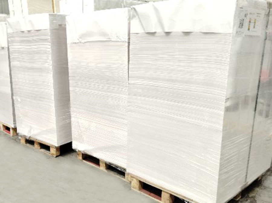 Clay coated paper in sheet