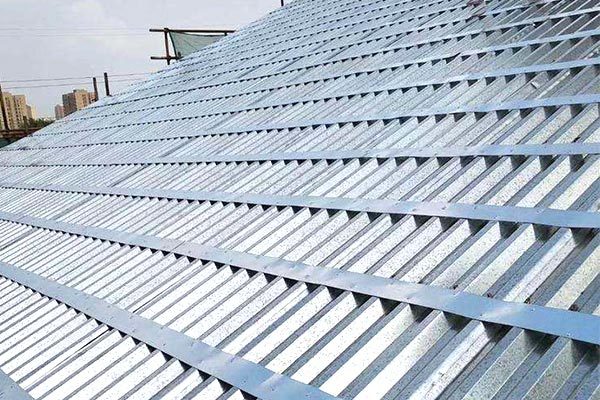 Corrugated roofing sheets are a popular choice for covering roofs on residential and commercial buildings.