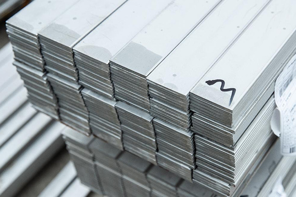 A flat bar is a long strip of metal that is rectangular in shape and has a flat surface.