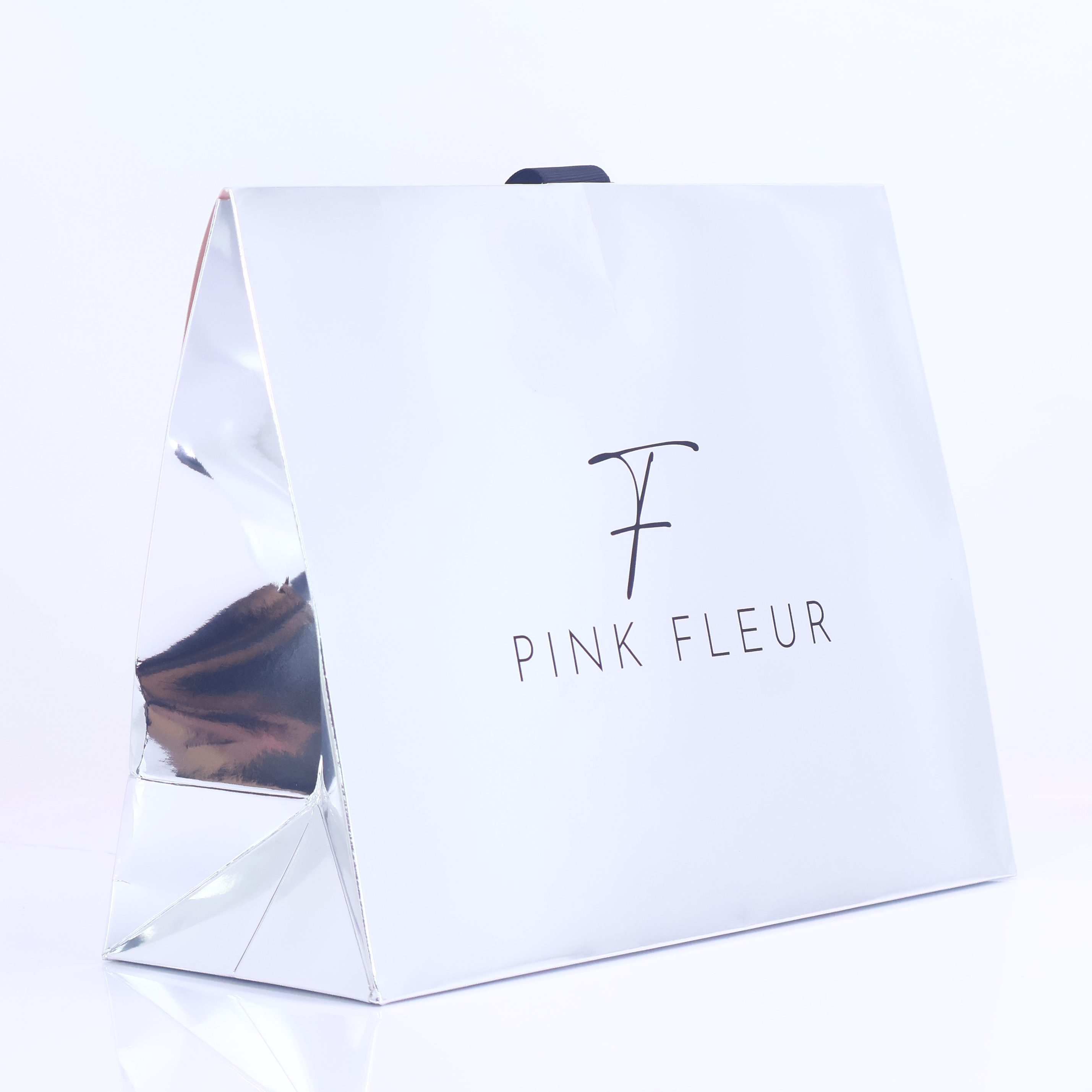 Silver reflective triangular paper bag