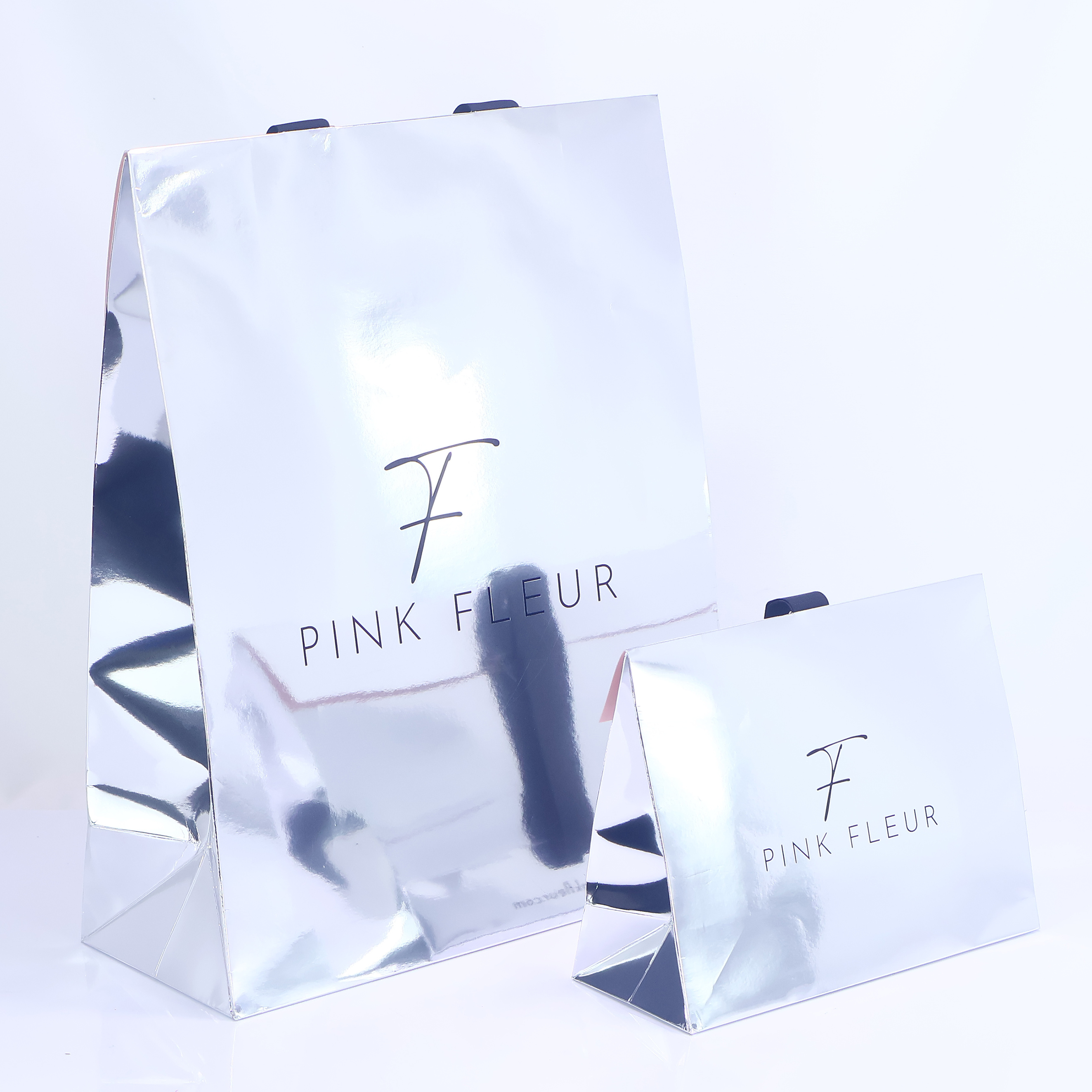 Silver reflective triangular paper bag