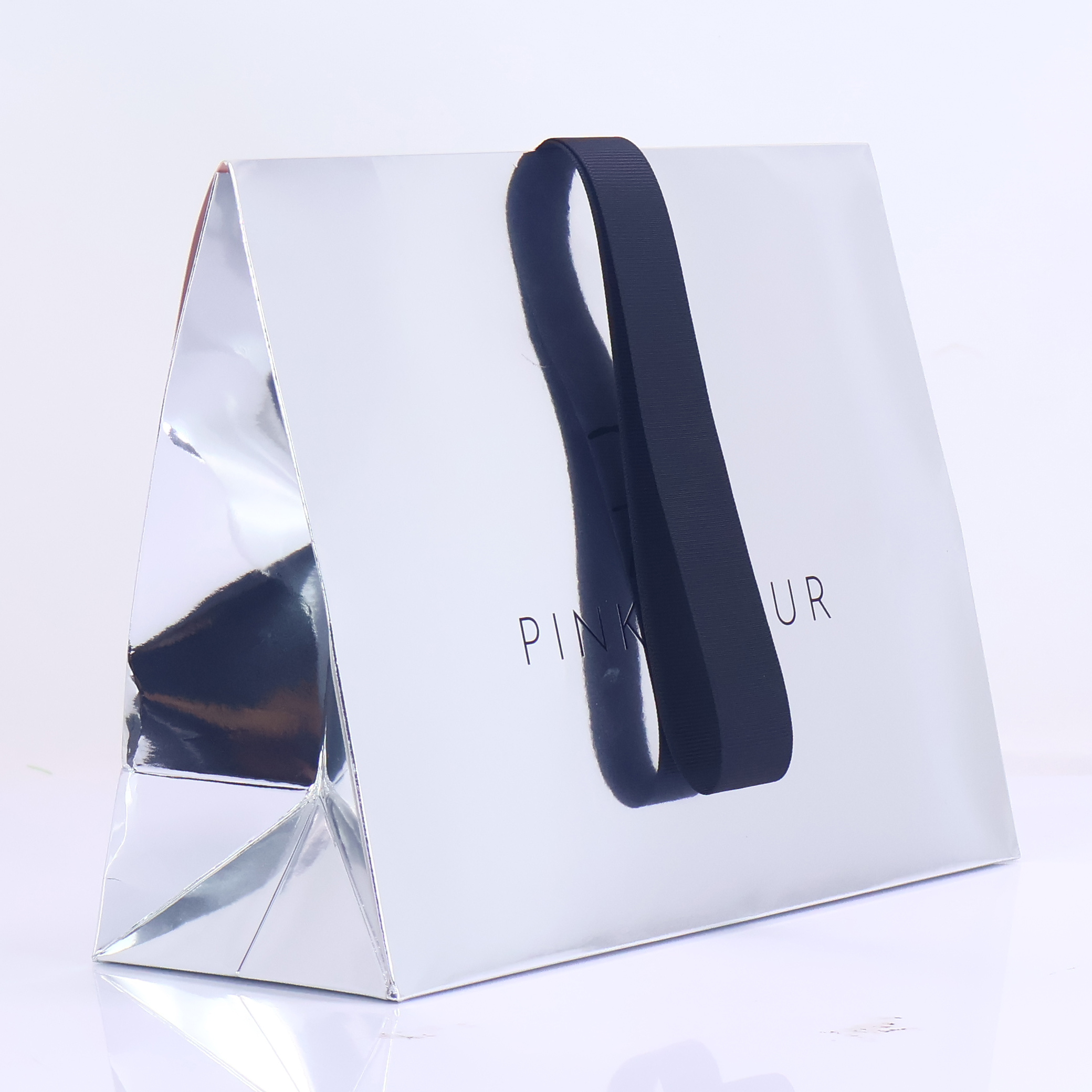 Silver reflective triangular paper bag