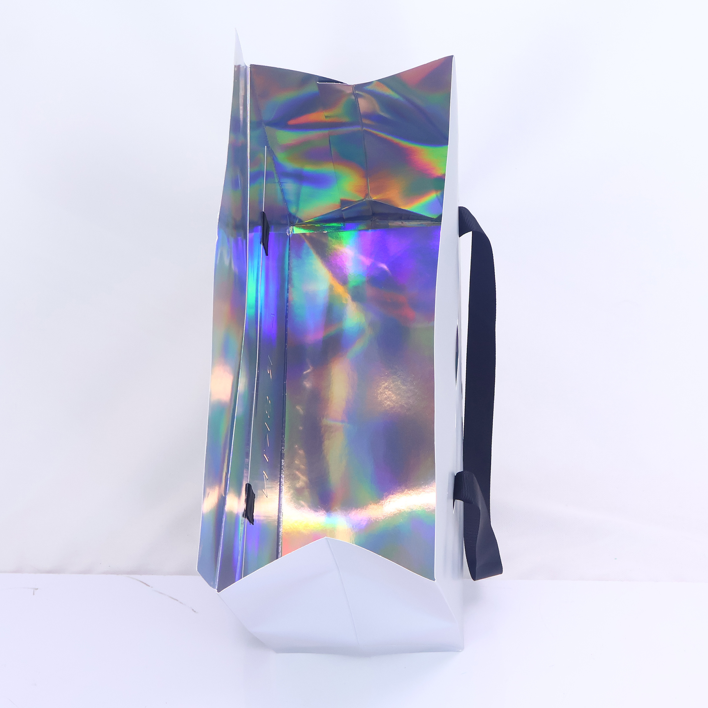 Grey triangular paper bag with ribbon handle