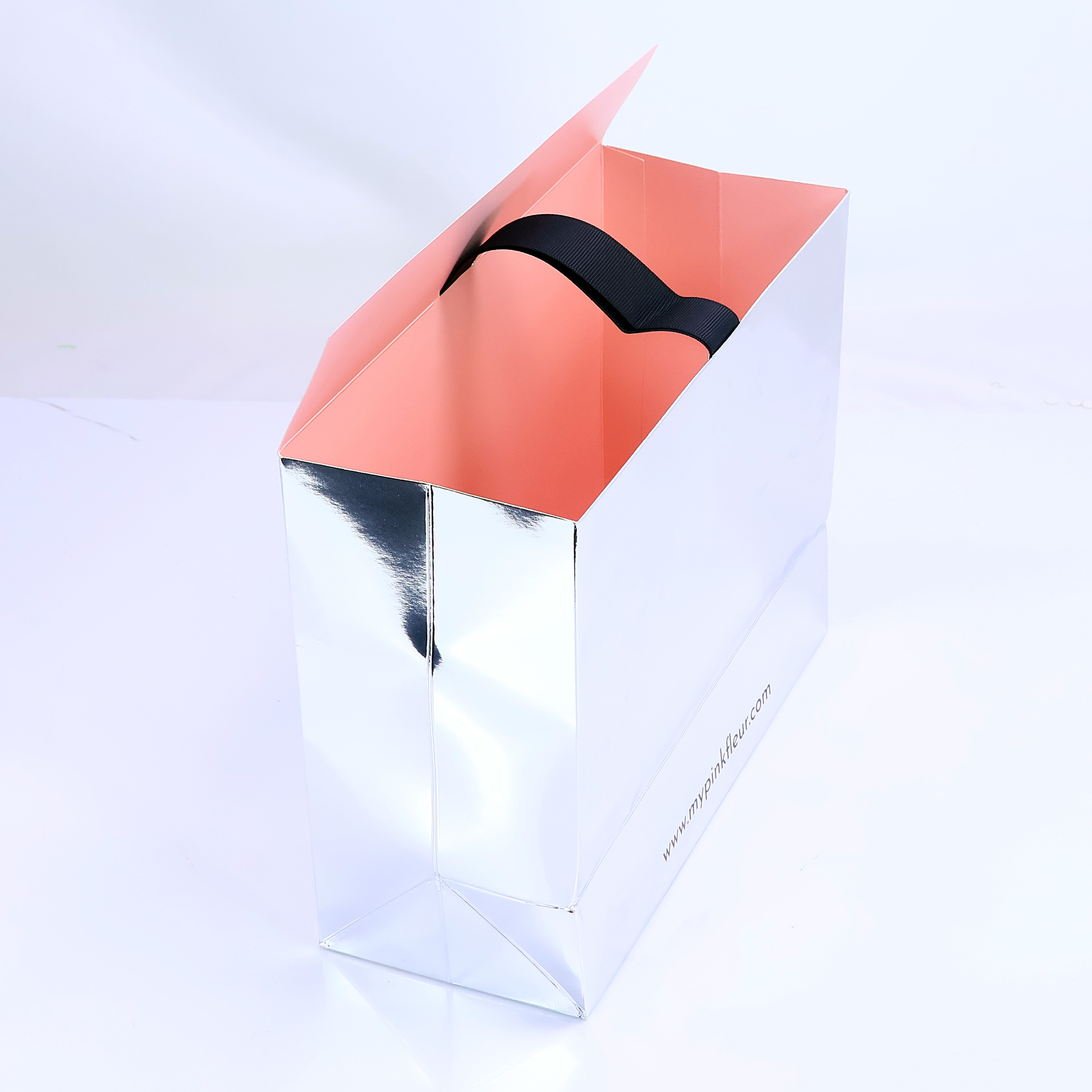 Silver reflective triangular paper bag