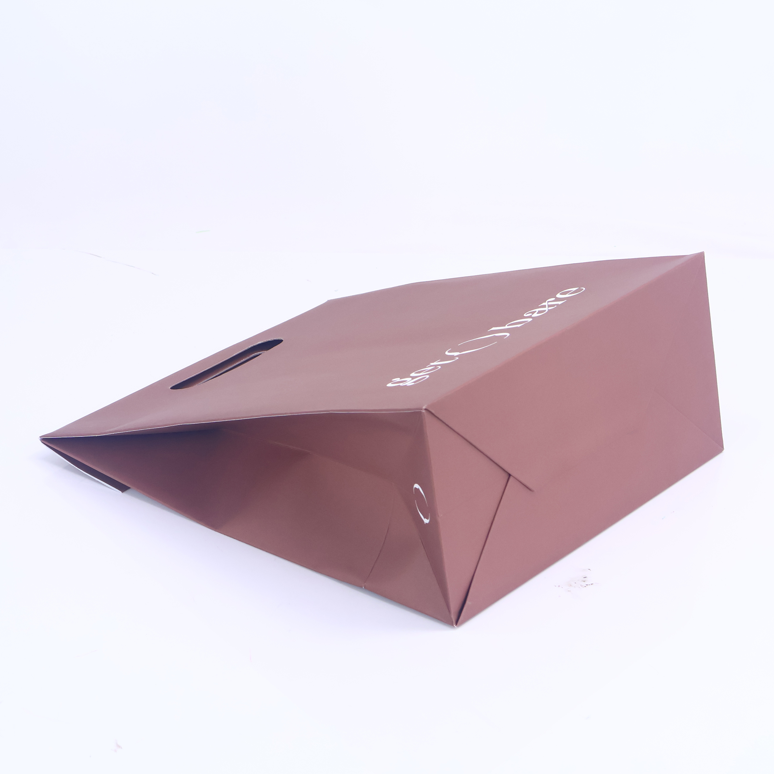 Brown die cut paper bag