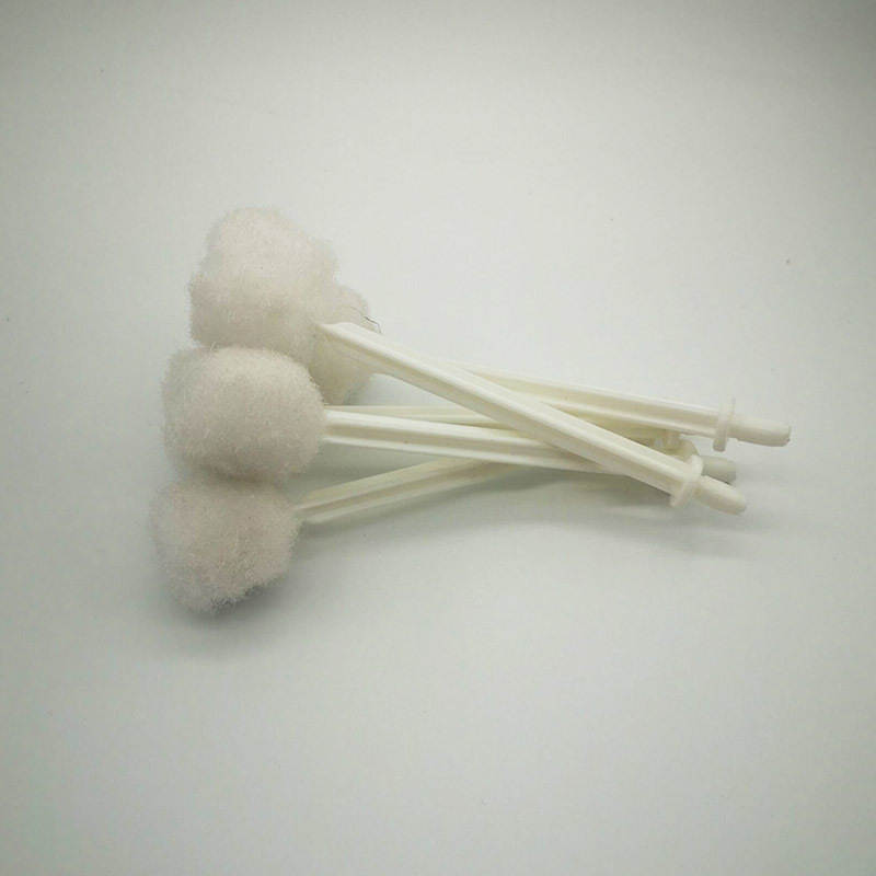 A smear brush. bottle cap brush