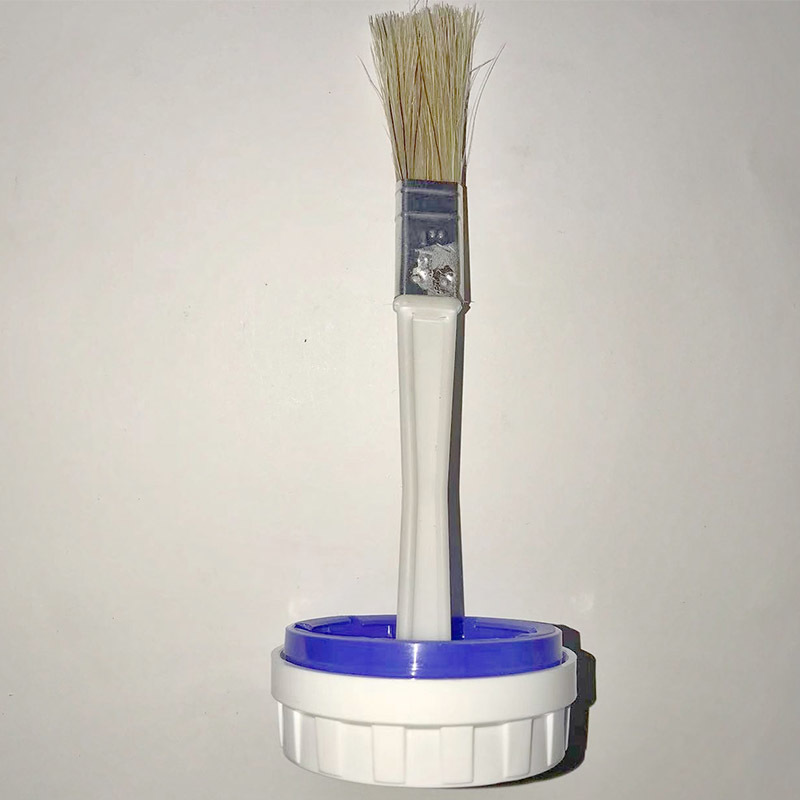 Bristle bottle cap brush with bottle cap