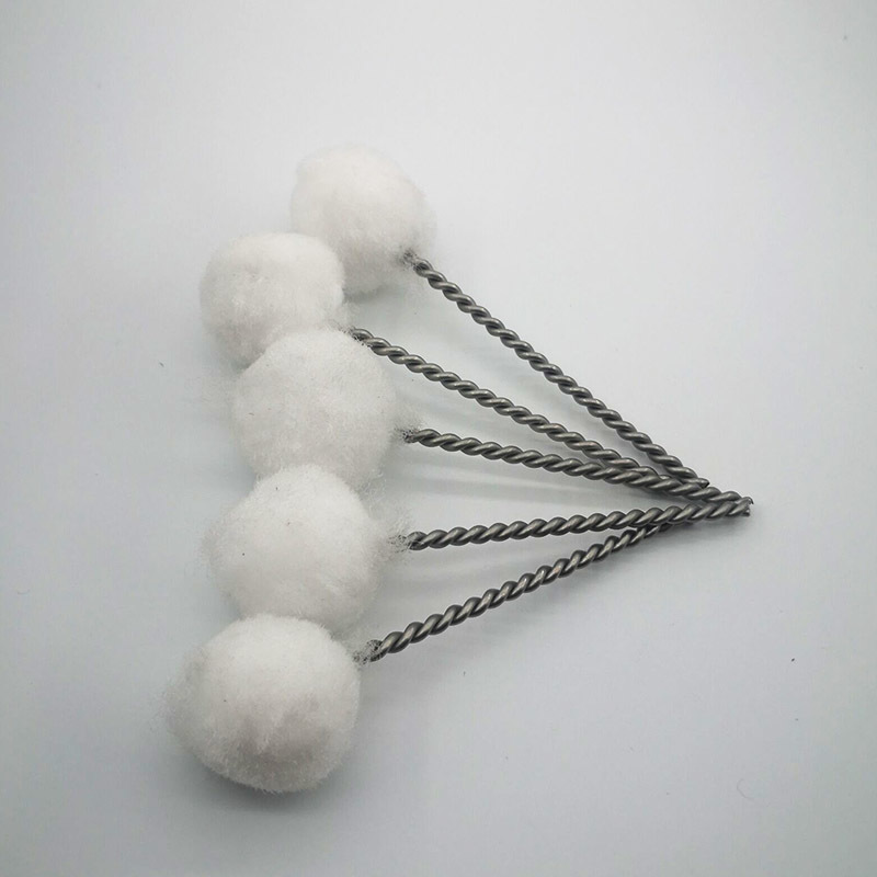 A smear brush. bottle cap brush
