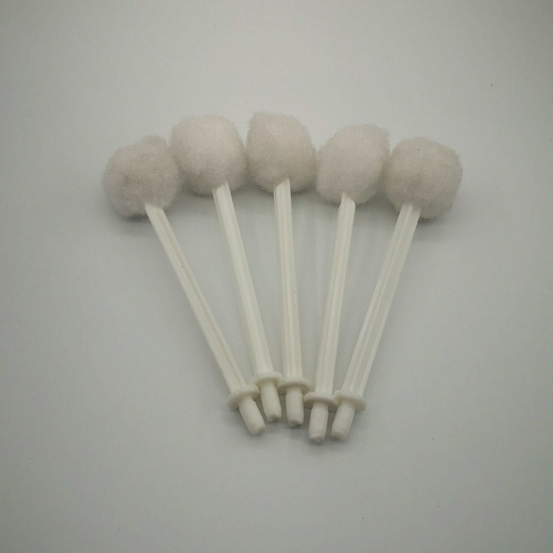 A smear brush. bottle cap brush