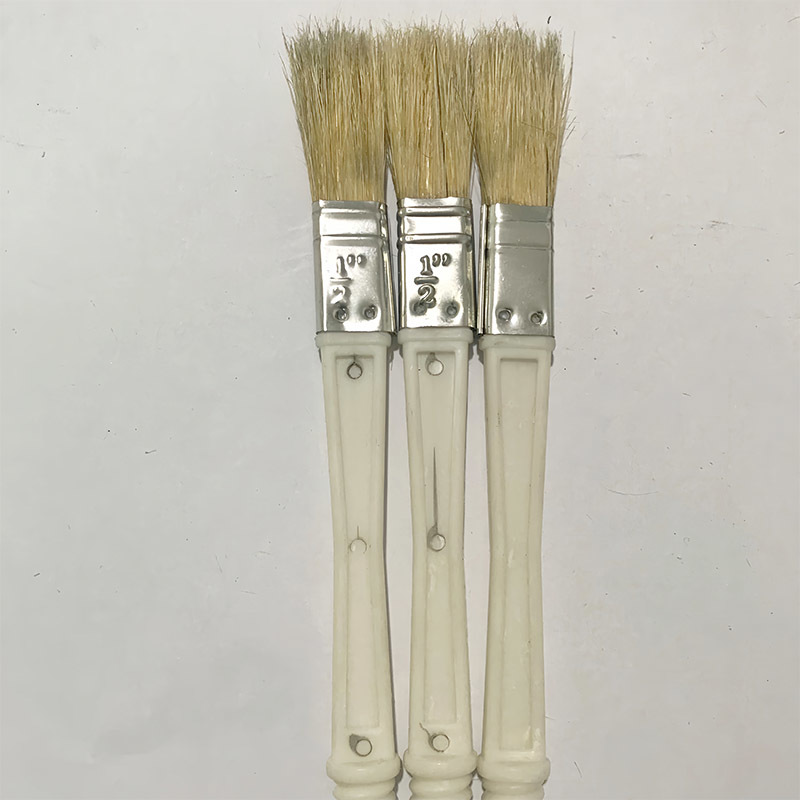 A smear brush. bottle cap brush