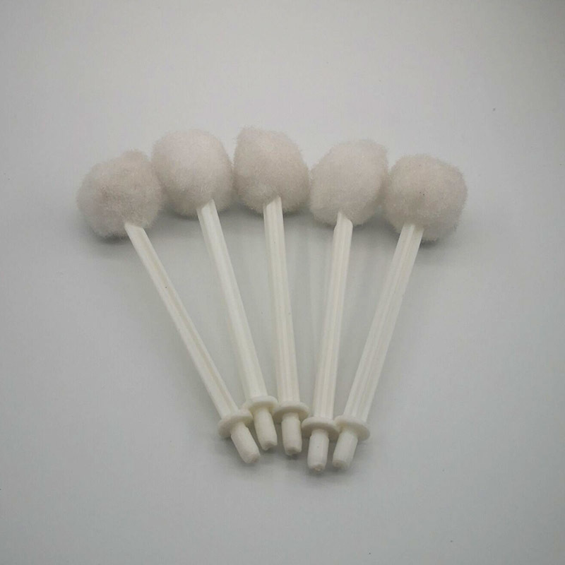 A smear brush. bottle cap brush