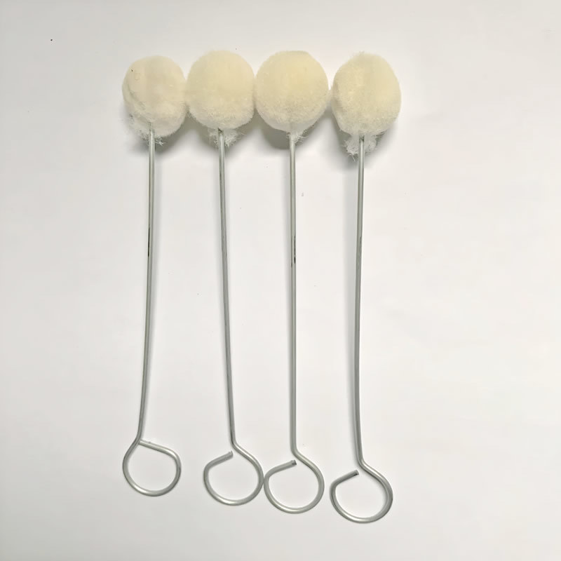 Wool ball brush