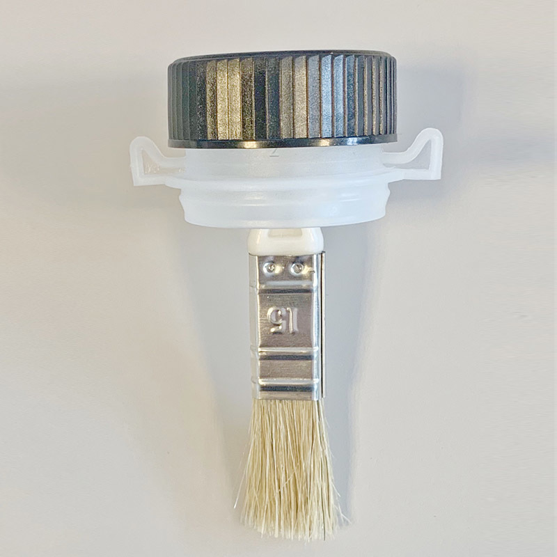 A smear brush. bottle cap brush