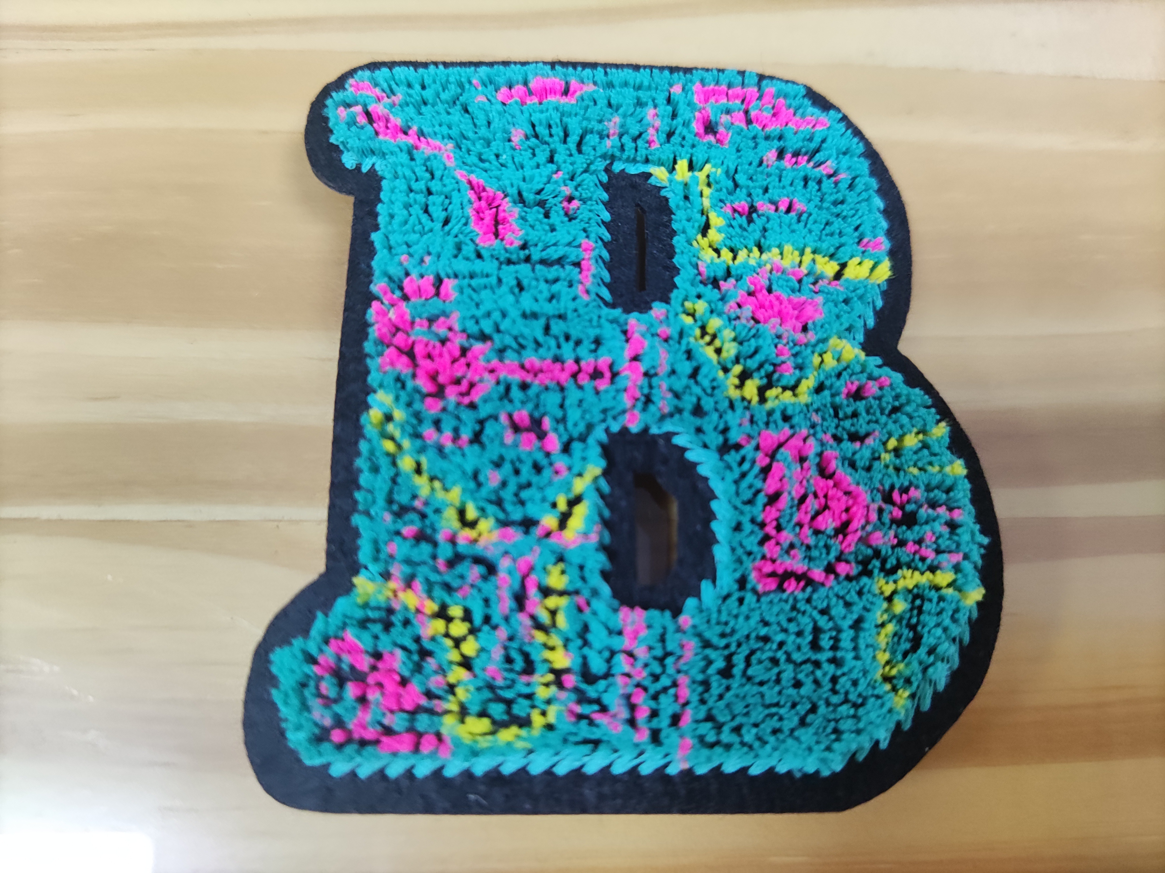 Heat transfer embroidered patches with adhesive backing Heat transfer embroidered patches with adhesive backing