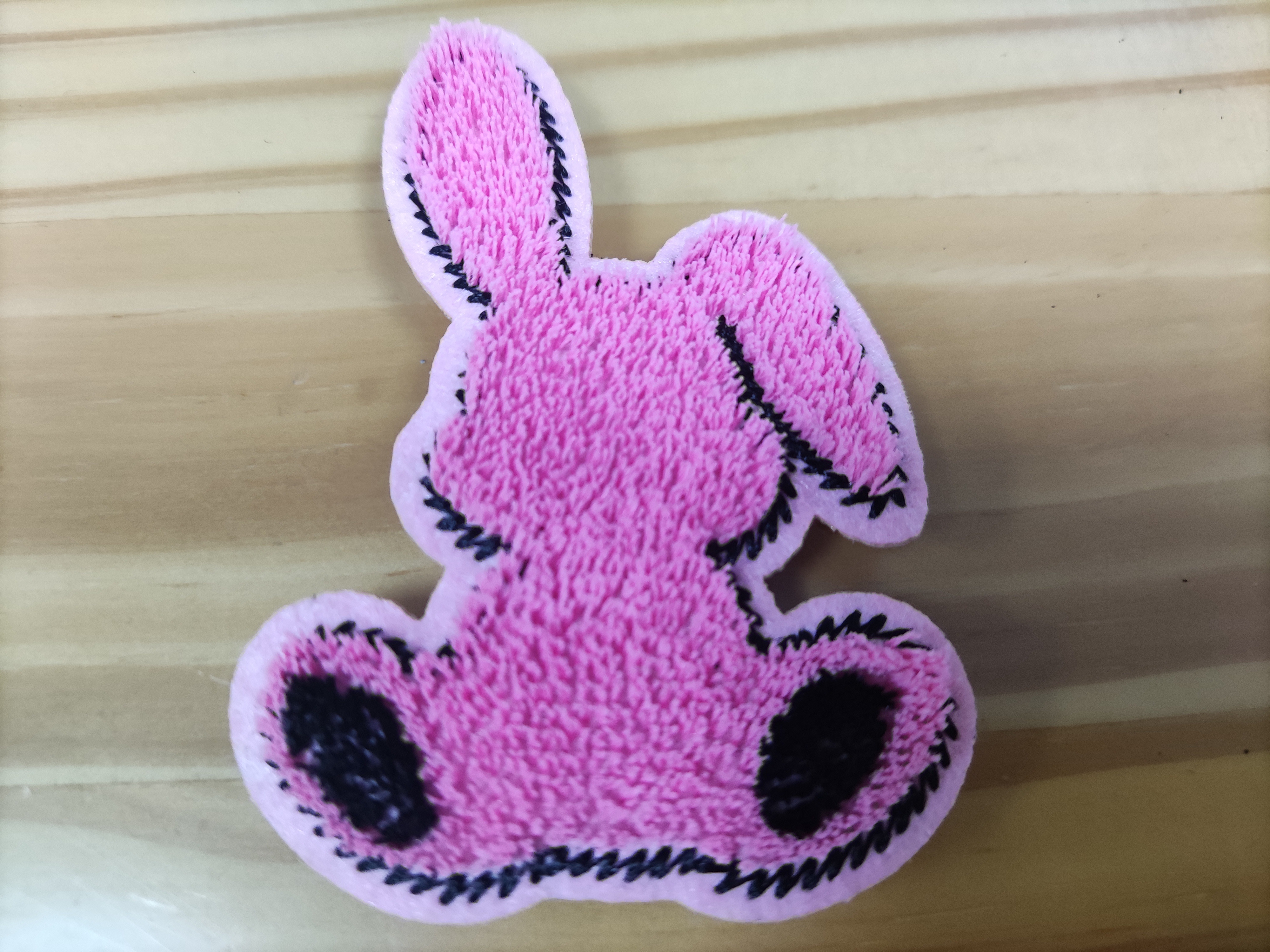 Heat transfer embroidered patches with adhesive backing Heat transfer embroidered patches with adhesive backing