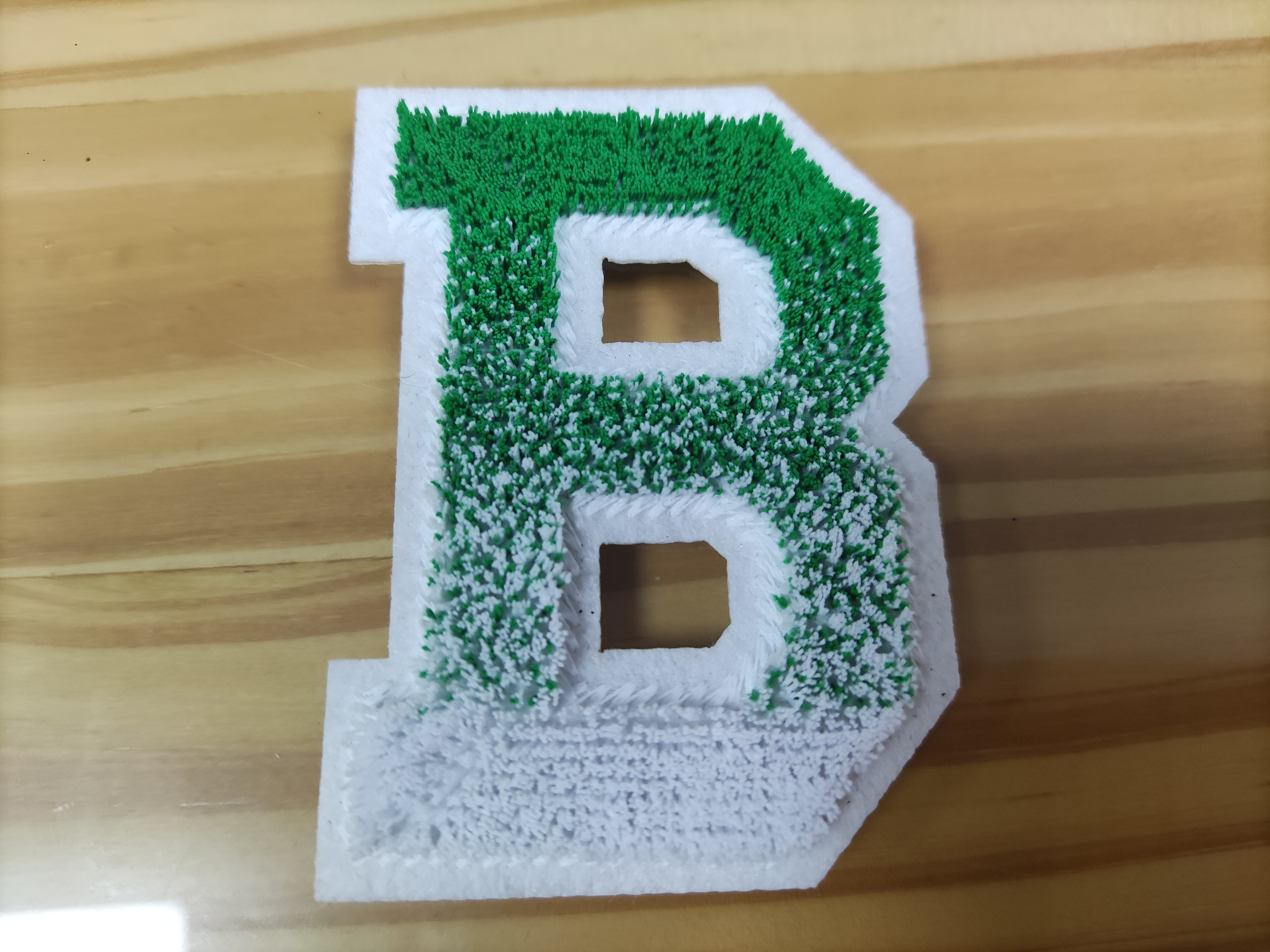 Heat transfer embroidered patches with adhesive backing Heat transfer embroidered patches with adhesive backing