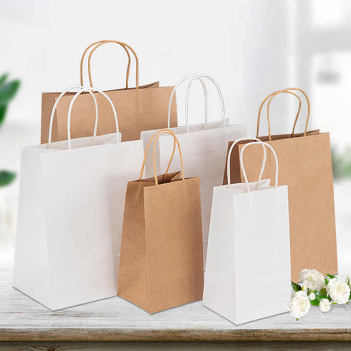 热卖定制牛皮纸袋可回收购物服装礼品袋带手柄食品带走