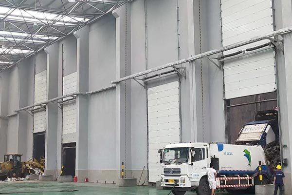 Garbage discharge door