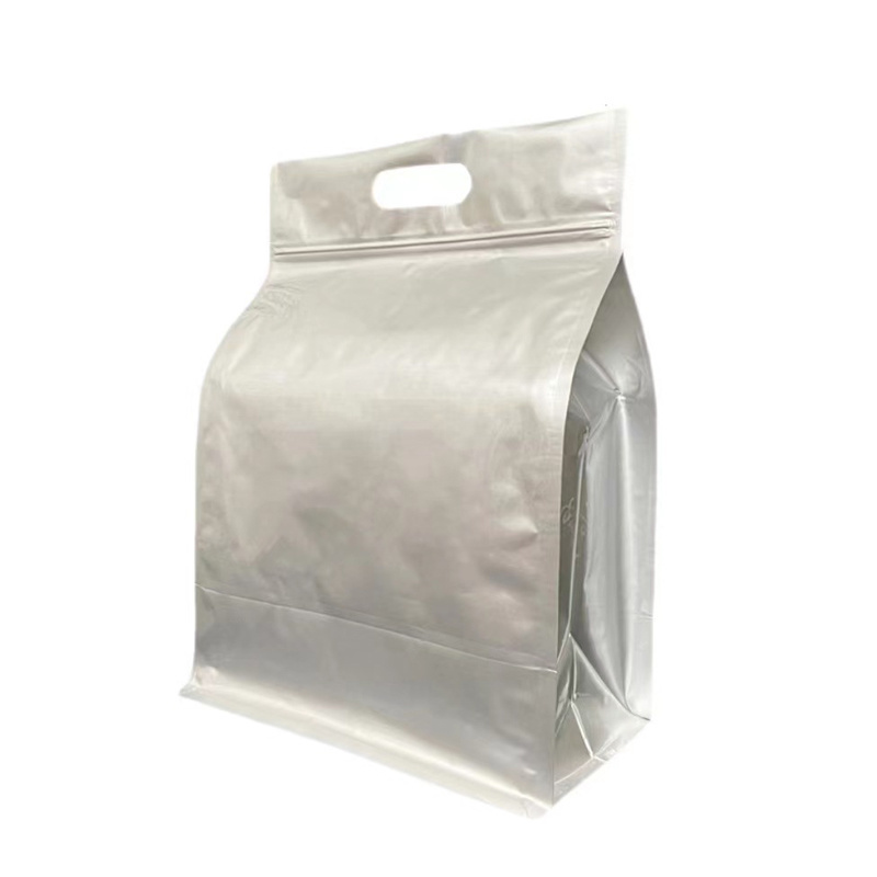 Aluminum foil bags are opaque, with excellent tactile and visual appeal. They are often combined with other materials to create finished bags.As the name suggests, an eight-sided sealing bag has eight sealed edges, with four sealed edges at the bottom and two sealed edges on each of the surrounding sides. This type of bag has become popular in the past two years, and many well-known e-commerce brands are now using this type of bag. The eight-sided sealing bag is favored by customers because of its good three-dimensional effect, making it look more layered and visually appealing.The eight-sided sealed bag is the most suitable flat bottom bag for thin film materials among the three types of flat bottom bags. This packaging combines the advantages of thin film materials and the shelf visual performance of flat bottom standing, increasing the volume compared to traditional self-standing bags. It is a new choice for upgrading traditional thin film upright bags. It can be equipped with a zipper for easy repeated use, avoiding the drawback of accordion bags without zippers, and can also be equipped with a one-way exhaust valve.