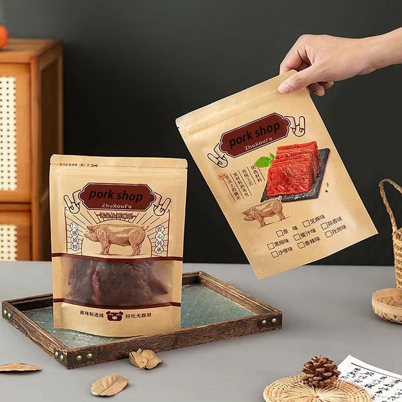 The self-standing zipper kraft paper window bag can be used to package a variety of products such as snacks, nuts, cookies, candies, coffee beans, tea leaves, dried fruits, grains, seeds, spices, herbs, bath salts, small toys, cosmetics, jewelry, and more. Its versatile design and durable material make it ideal for storing and displaying a wide range of items in a stylish and convenient way. The clear window allows for easy visibility of the contents inside, while the zip closure ensures freshness and easy access to the products. Perfect for retail, food, gift, and personal use.