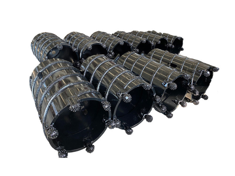 Core barrel with roller bits