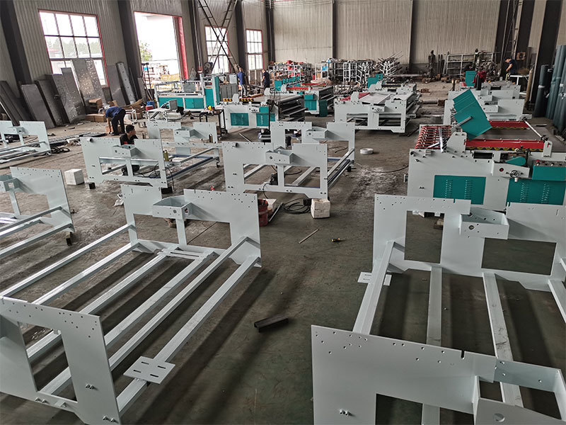 Semi-automatic box gluing machine