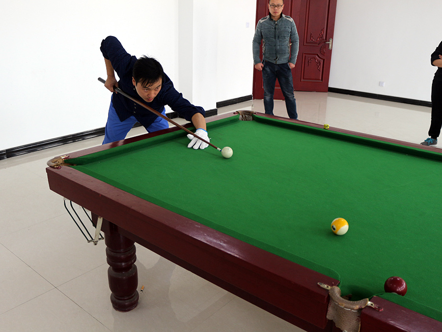 Play billiards