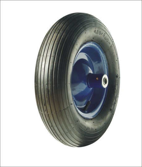 Low noise longitudinal tread metal bearing pneumatic wheel.