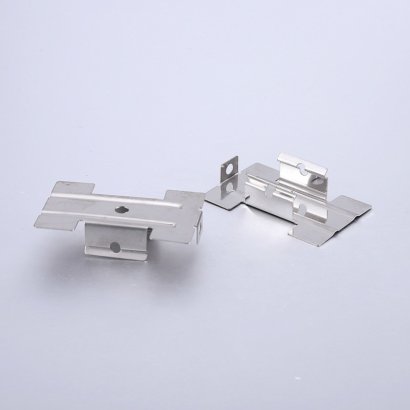 Nickel colored iron clips for lighting tracks and fixtures