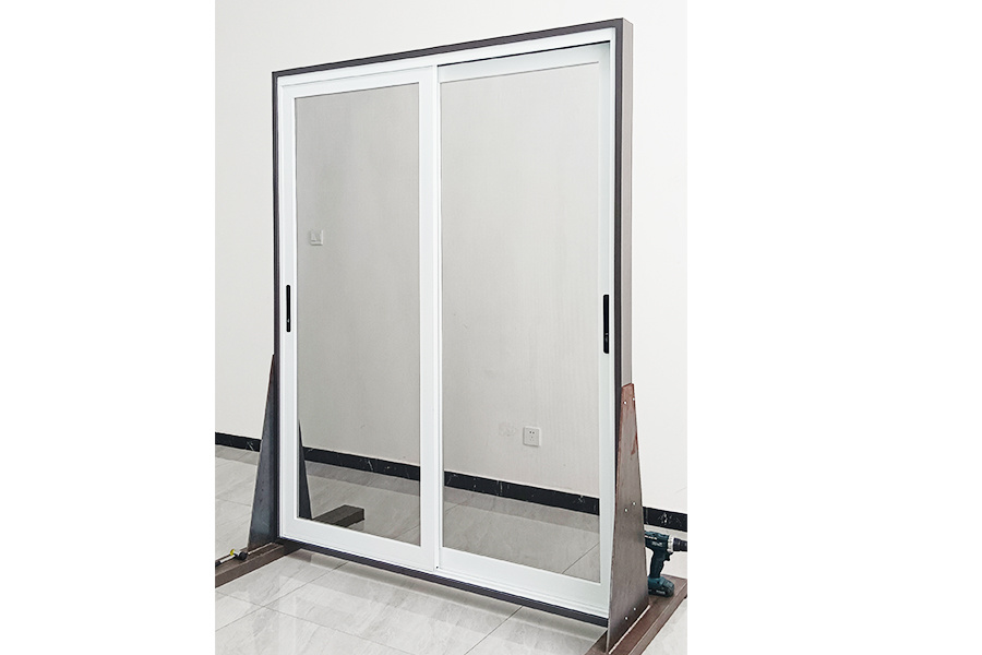 Double track sliding screen door