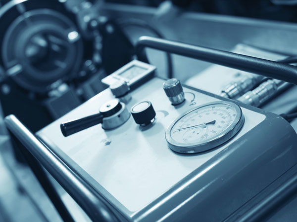 What are the causes of air compressor exhaust pressure failure?