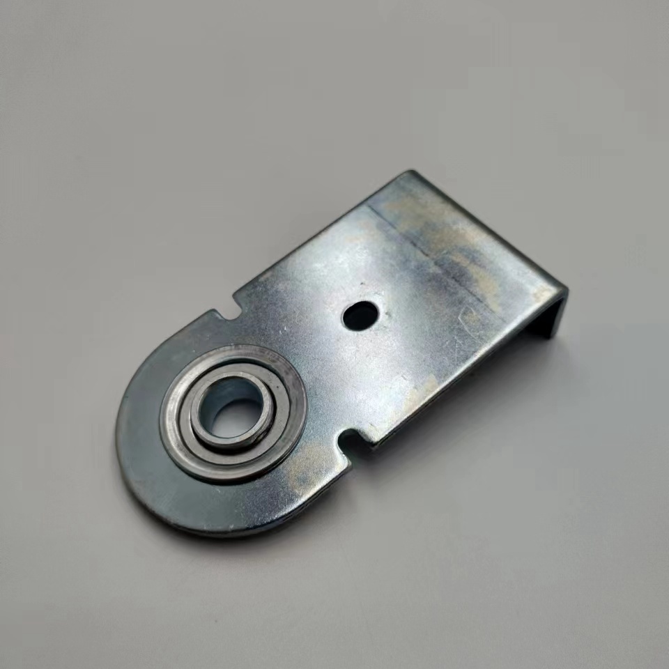 M-12204 Zinc-plated bracket with bearing 12118 stamped in