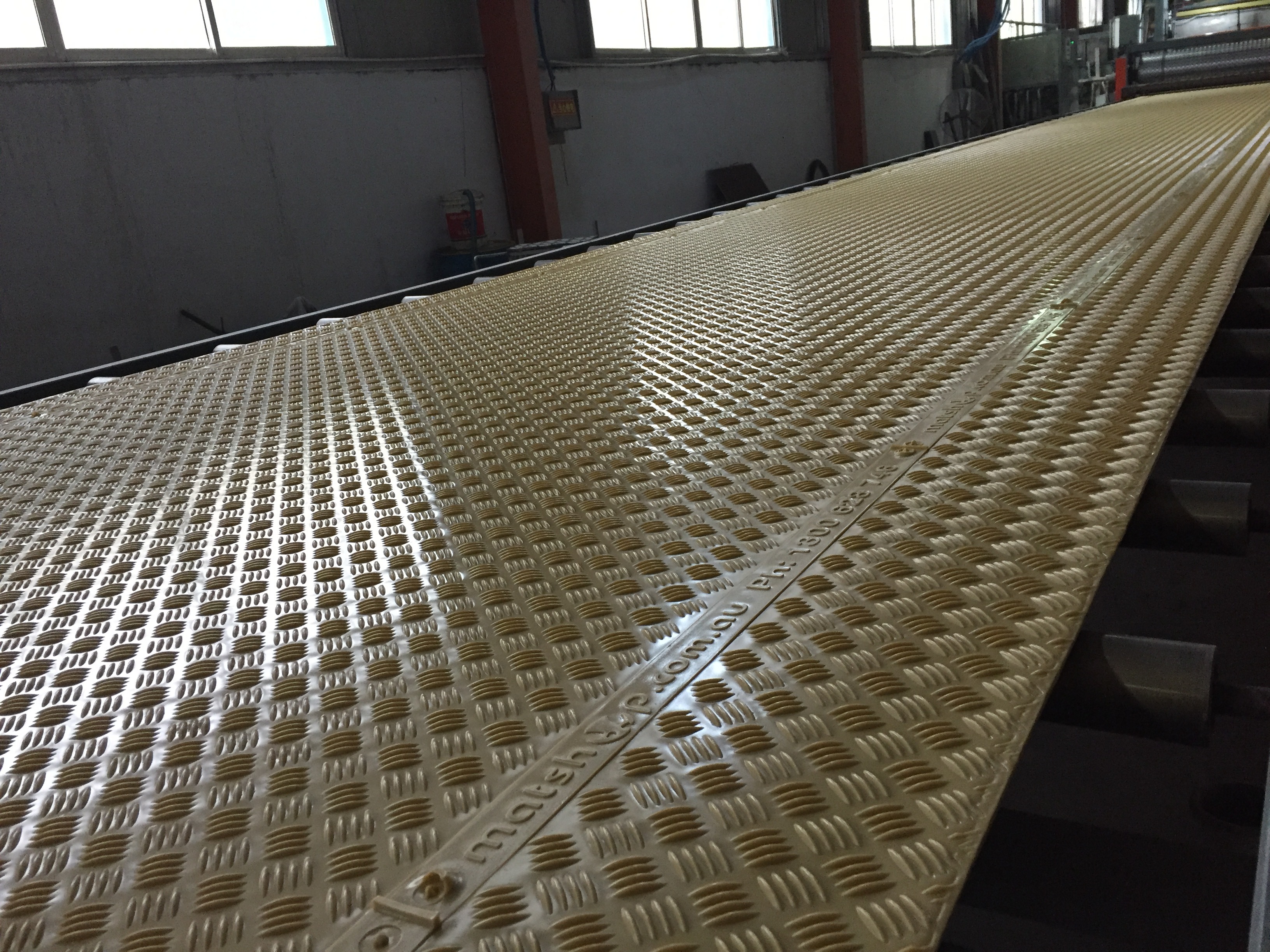 Ground protection mats production line