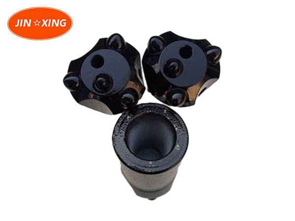 Rock drilling tools