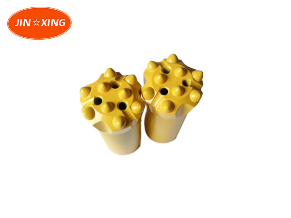Rock drilling tools