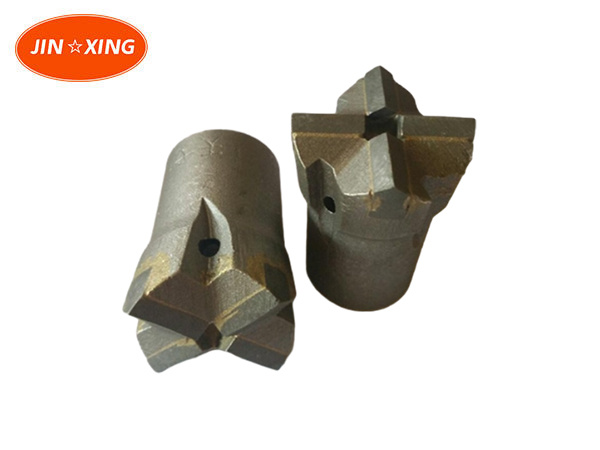 Rock drilling tools