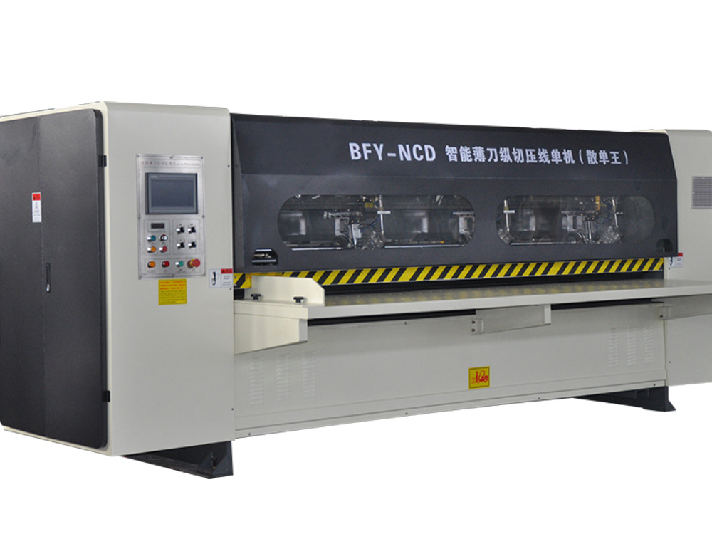 Thin blade slitter scroer machine