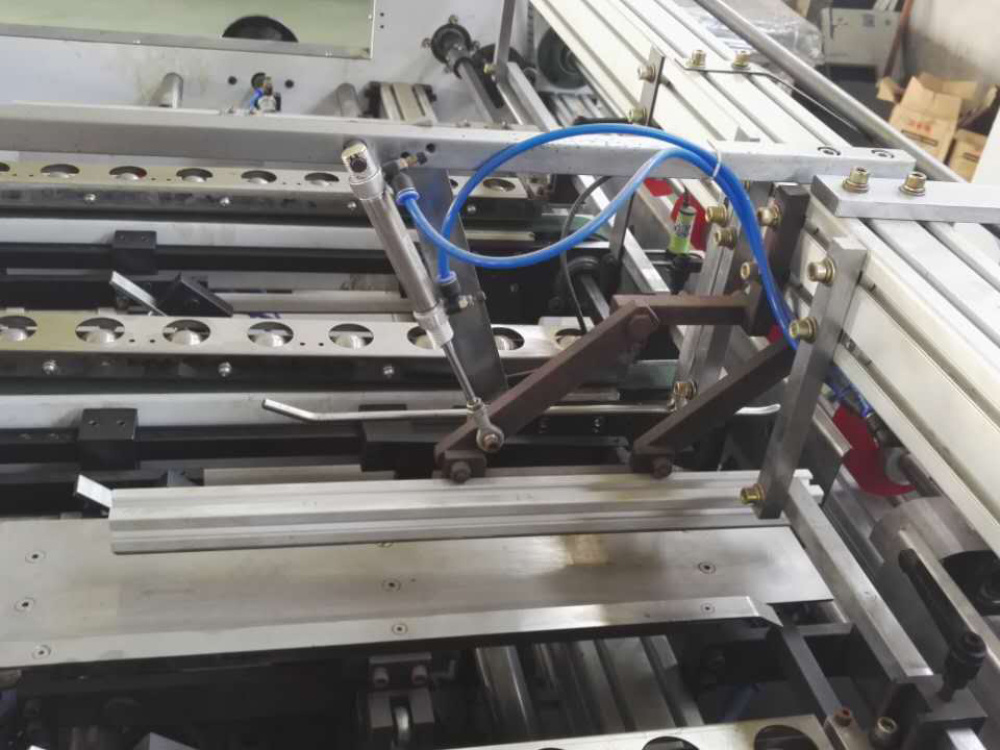 Two piece gluer machine