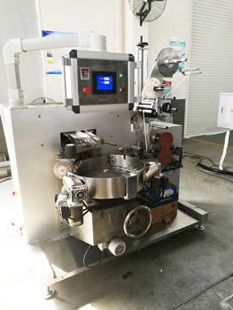 TK-300 LOLLIPOP LABELING MACHINE