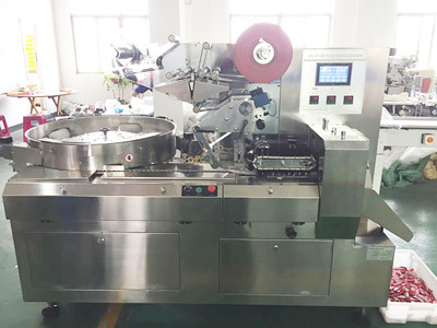 TK-1200 HIGH SPEED CANDY PILLOW PACKER