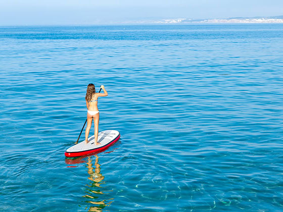 Where can you play paddle boarding what are the requirements of the waters where paddle boarding is carried out