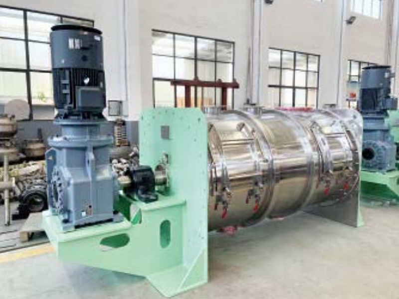Horizontal ribbon mixer for battery materials