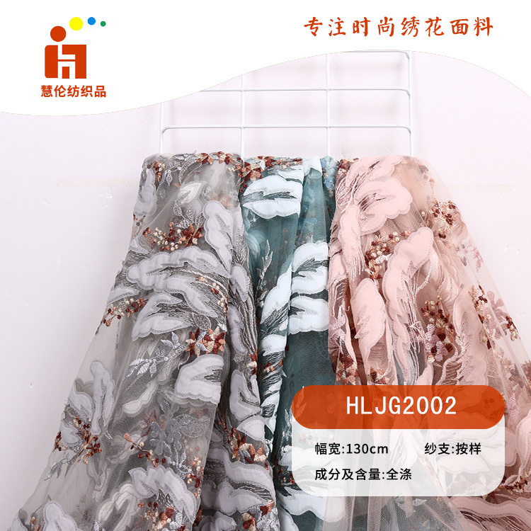 新品刺绣 卫衣外套装饰刺绣布料 现货 多色线贴布激光平绣面料