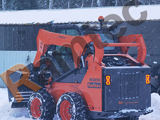 In the first snowfall of 25 years, Ramtec skid steer loader efficiently shoveled snow to show off its skills